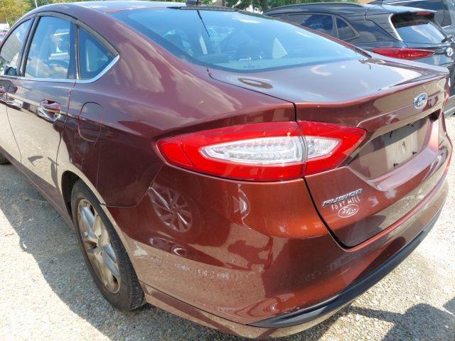 used 2016 Ford Fusion car, priced at $10,998