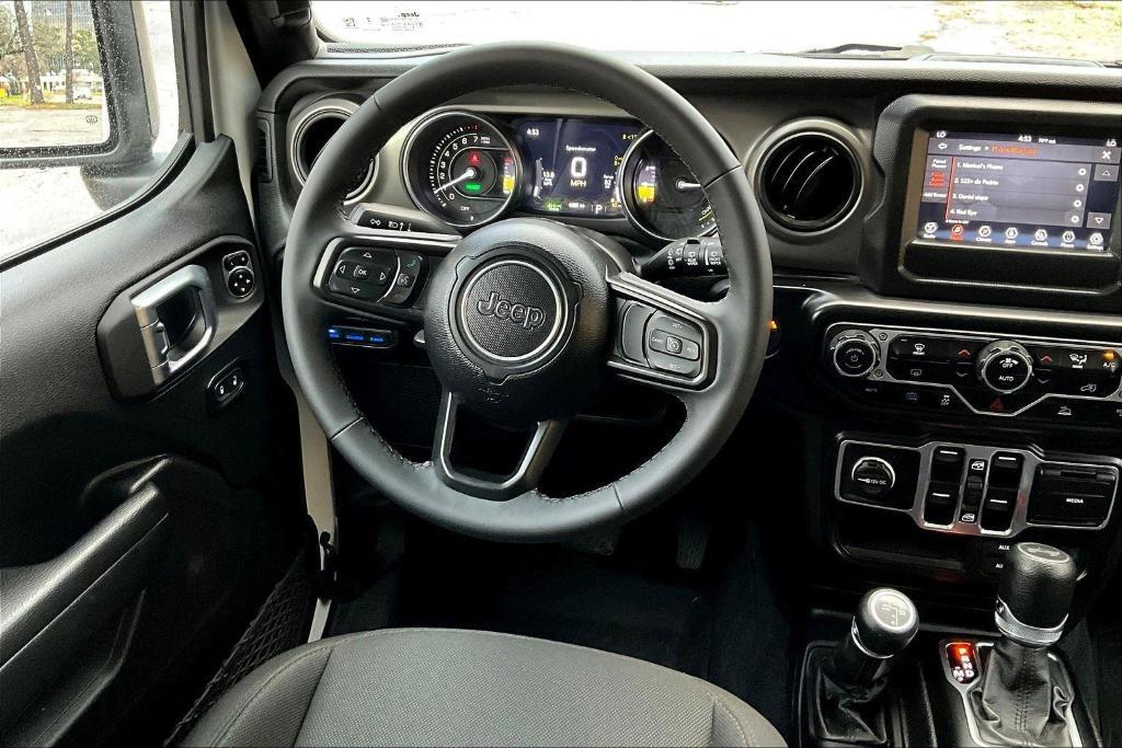 used 2023 Jeep Wrangler 4xe car, priced at $32,669