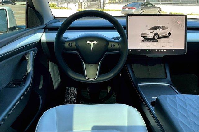 used 2024 Tesla Model Y car, priced at $35,000