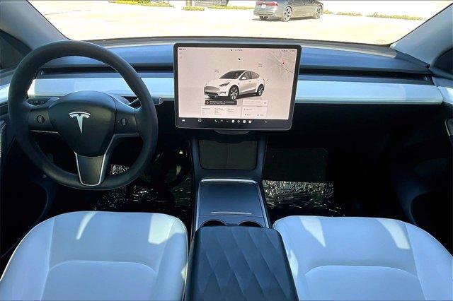 used 2024 Tesla Model Y car, priced at $35,000