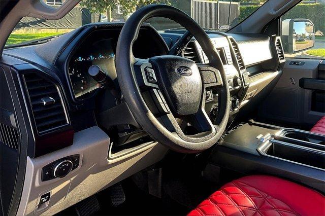 used 2019 Ford F-150 car, priced at $23,394