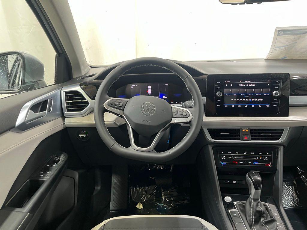 new 2025 Volkswagen Taos car, priced at $31,674