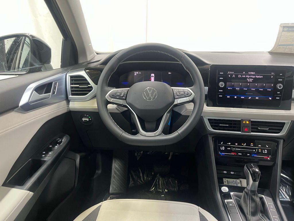 new 2025 Volkswagen Taos car, priced at $29,674