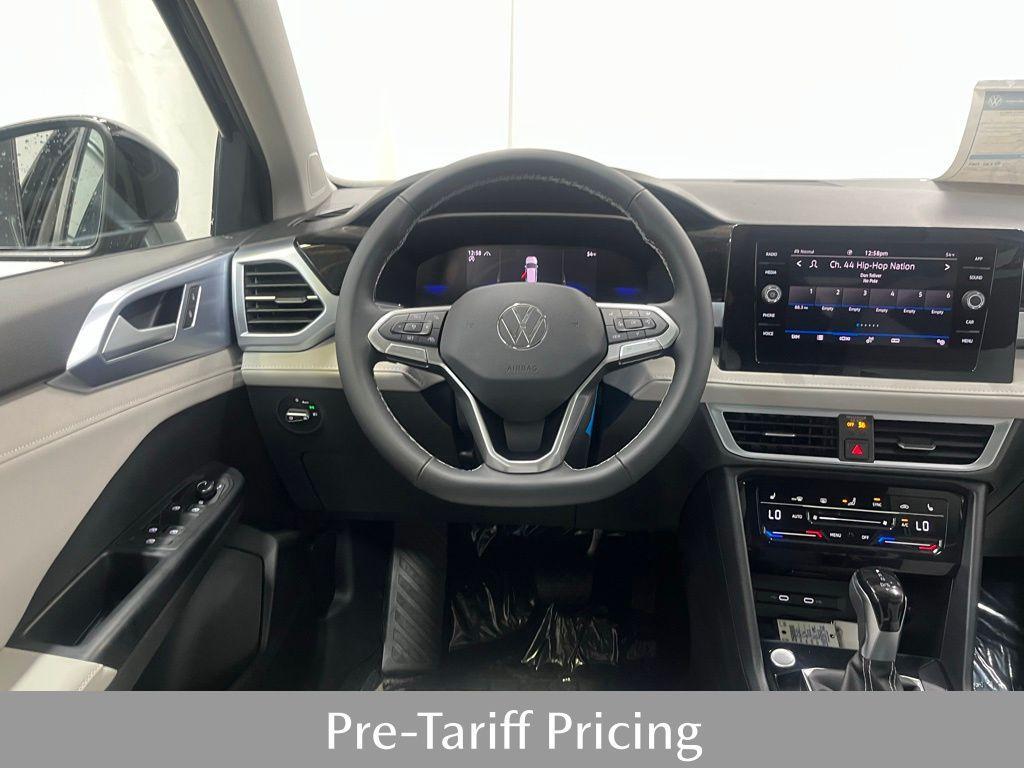 new 2025 Volkswagen Taos car, priced at $30,674
