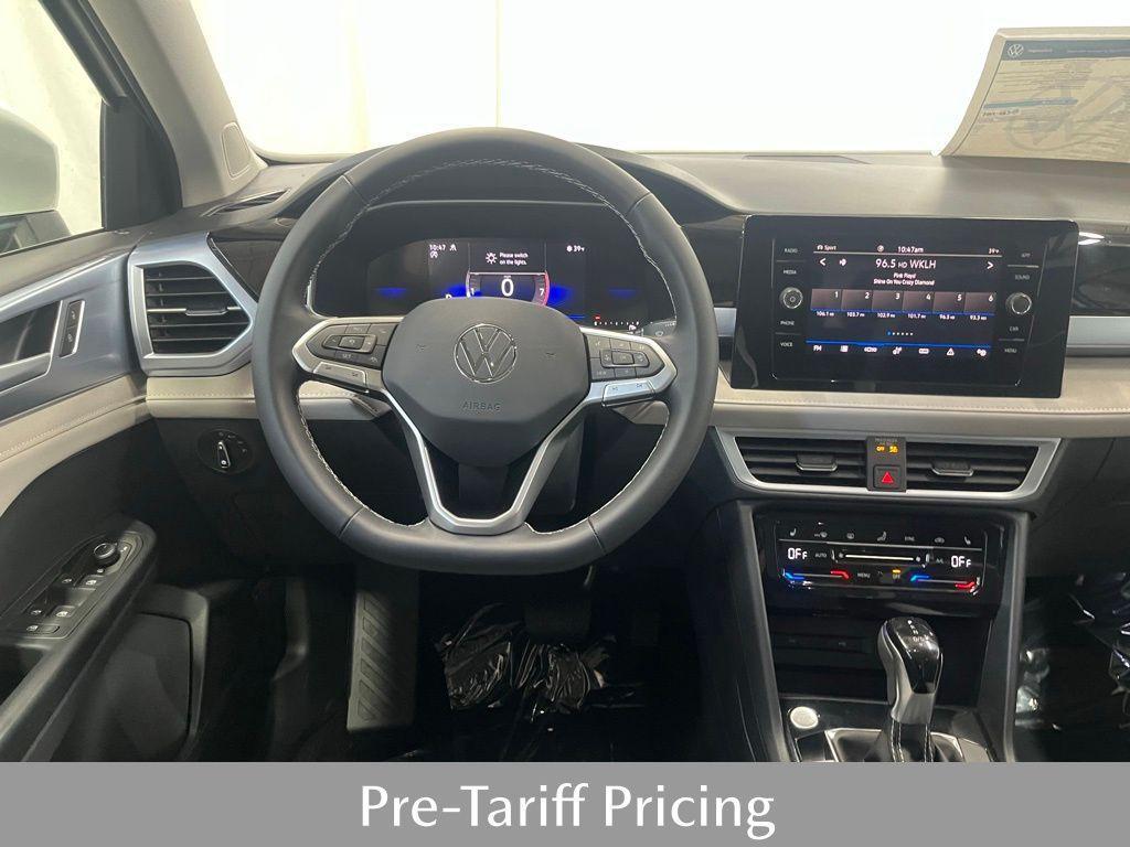 new 2025 Volkswagen Taos car, priced at $30,674