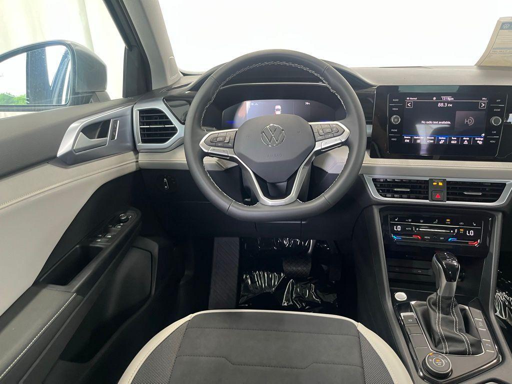 new 2025 Volkswagen Taos car, priced at $31,174