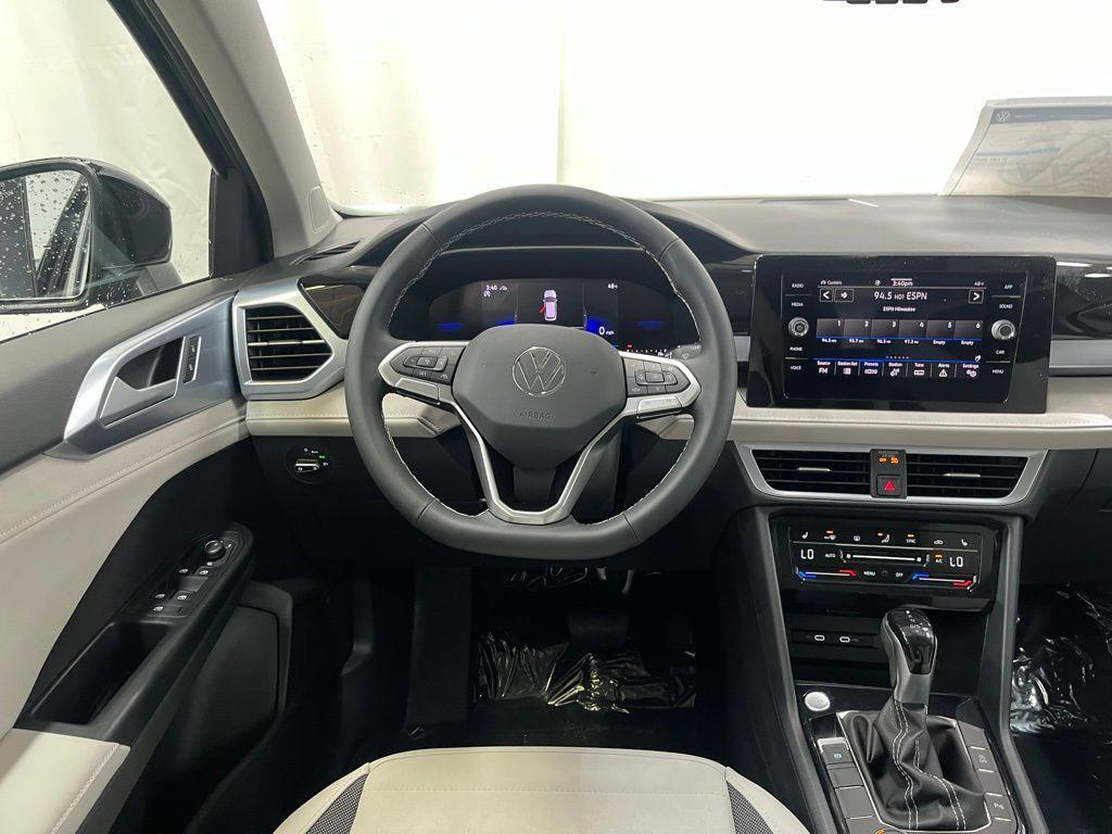 new 2025 Volkswagen Taos car, priced at $31,674