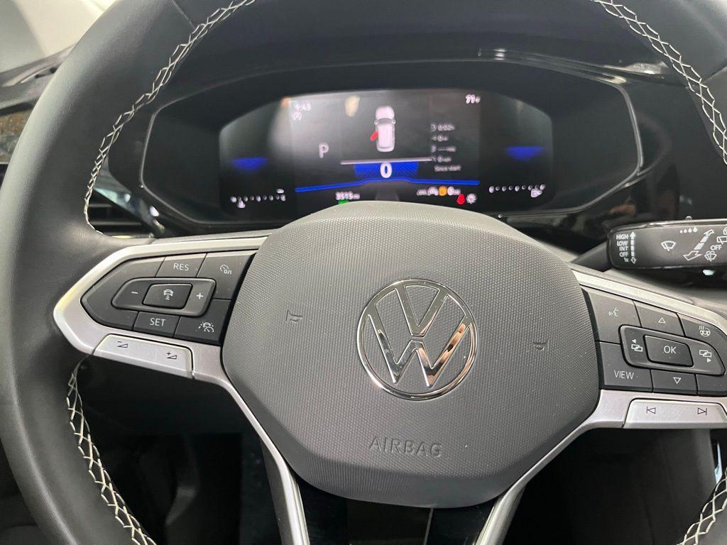 used 2024 Volkswagen Taos car, priced at $23,991