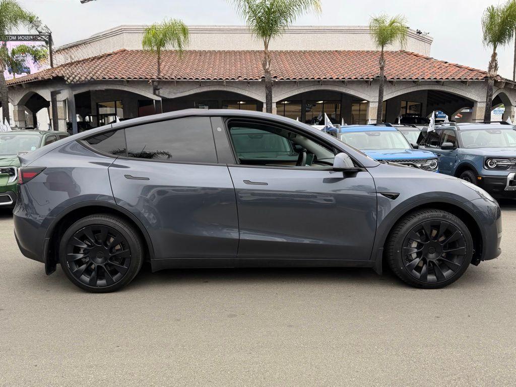 used 2023 Tesla Model Y car, priced at $28,000