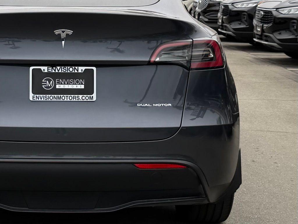 used 2023 Tesla Model Y car, priced at $28,000