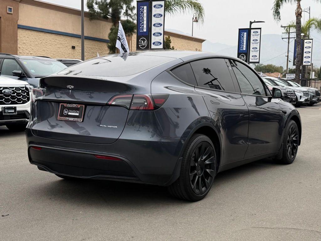 used 2023 Tesla Model Y car, priced at $28,000