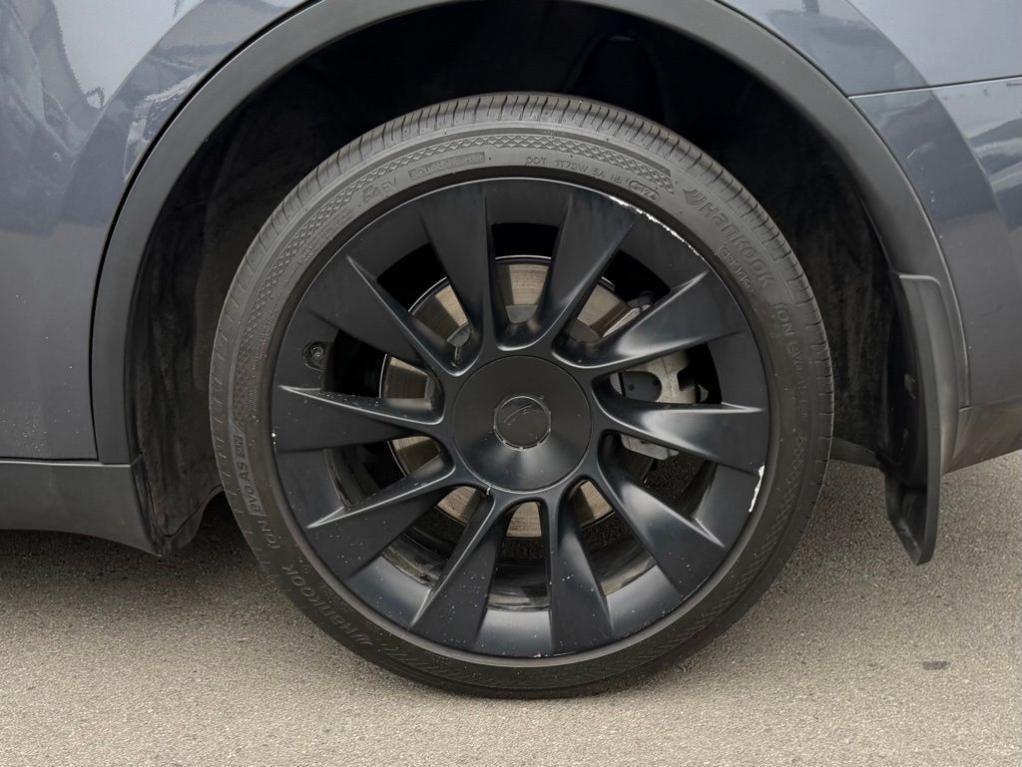 used 2023 Tesla Model Y car, priced at $28,000