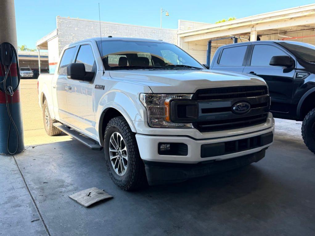 used 2018 Ford F-150 car, priced at $19,988