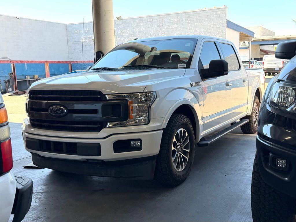 used 2018 Ford F-150 car, priced at $19,988