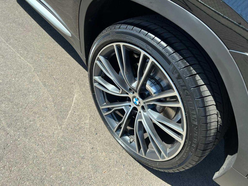 used 2023 BMW X4 car, priced at $30,299