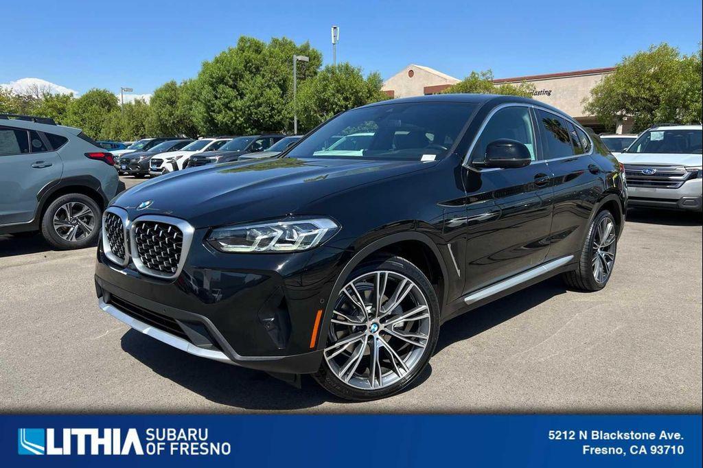 used 2023 BMW X4 car, priced at $30,299