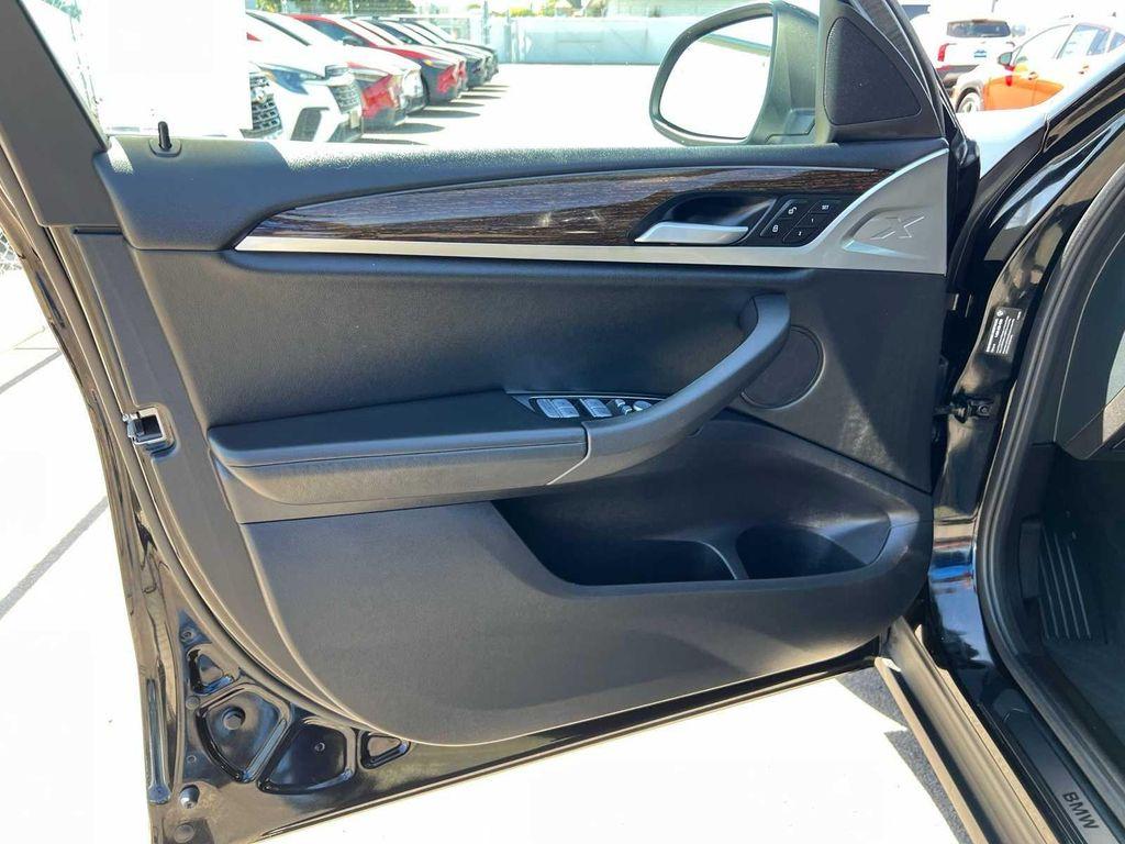 used 2023 BMW X4 car, priced at $30,299