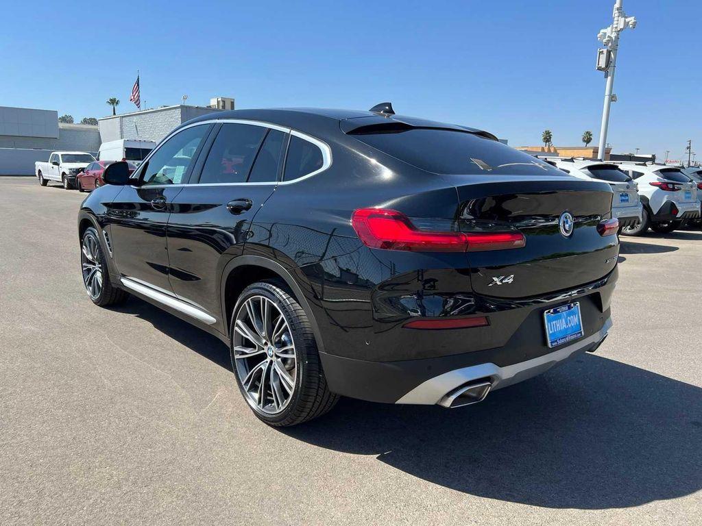 used 2023 BMW X4 car, priced at $30,299