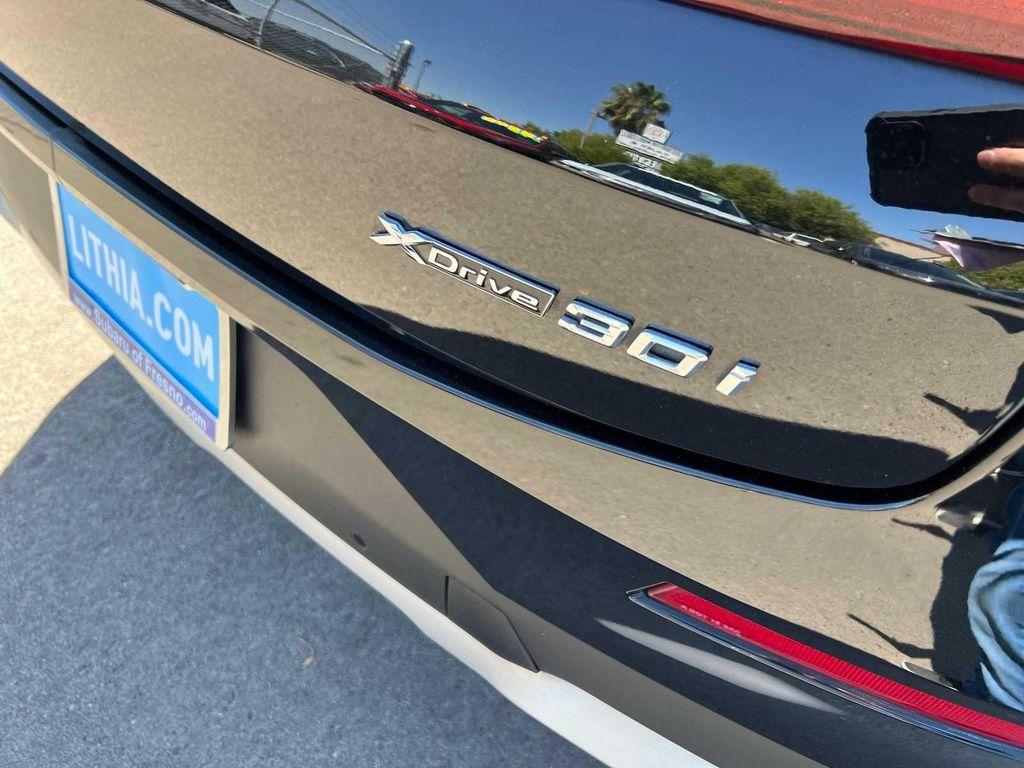 used 2023 BMW X4 car, priced at $30,299