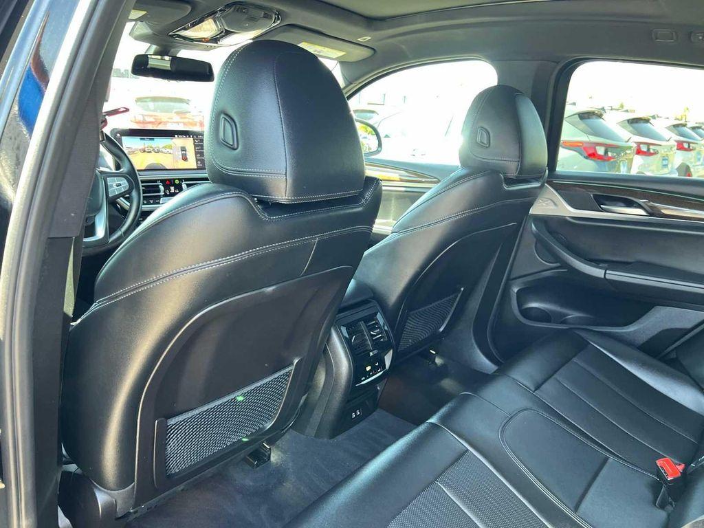 used 2023 BMW X4 car, priced at $30,299