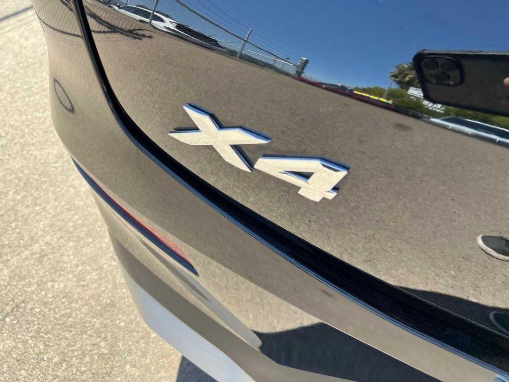 used 2023 BMW X4 car, priced at $30,299