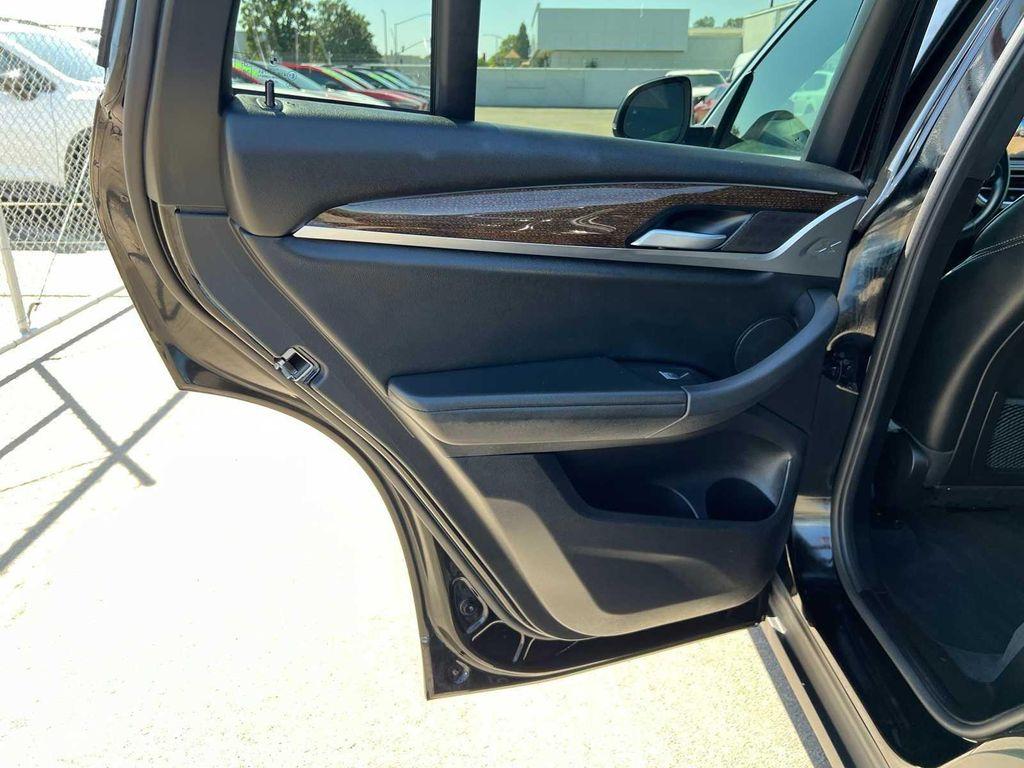 used 2023 BMW X4 car, priced at $30,299