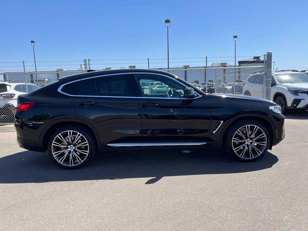 used 2023 BMW X4 car, priced at $30,299