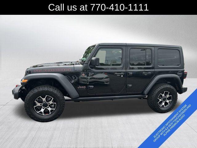 used 2021 Jeep Wrangler Unlimited car, priced at $38,491