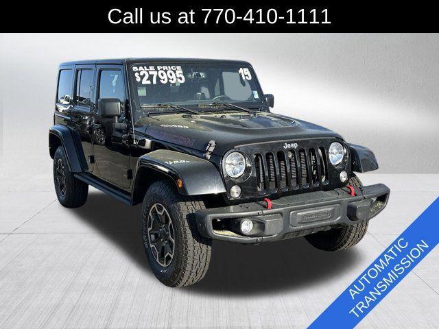used 2015 Jeep Wrangler Unlimited car, priced at $23,991