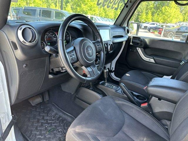 used 2015 Jeep Wrangler Unlimited car, priced at $24,491