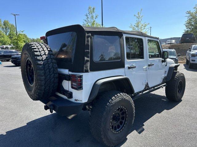 used 2015 Jeep Wrangler Unlimited car, priced at $24,491