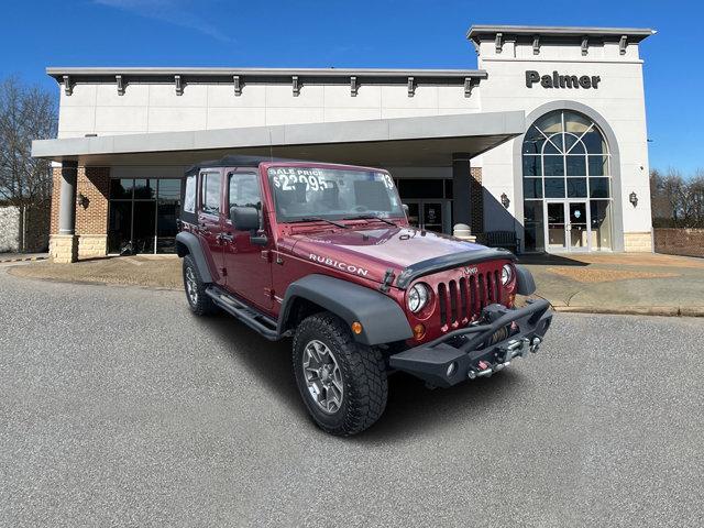 used 2013 Jeep Wrangler Unlimited car, priced at $19,391