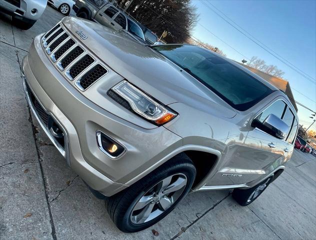 used 2014 Jeep Grand Cherokee car, priced at $14,498