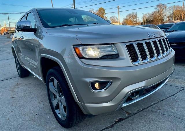 used 2014 Jeep Grand Cherokee car, priced at $14,498