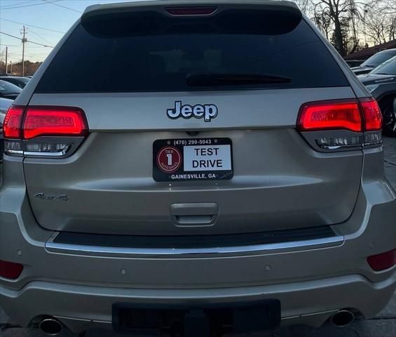 used 2014 Jeep Grand Cherokee car, priced at $14,498