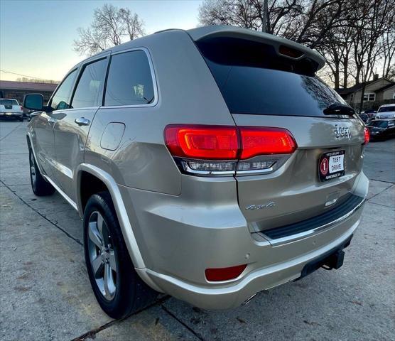 used 2014 Jeep Grand Cherokee car, priced at $14,498