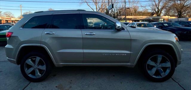 used 2014 Jeep Grand Cherokee car, priced at $14,498