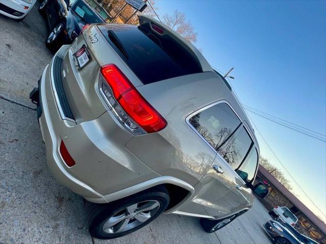 used 2014 Jeep Grand Cherokee car, priced at $14,498