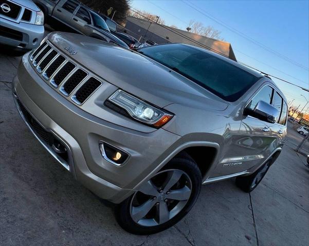 used 2014 Jeep Grand Cherokee car, priced at $14,498