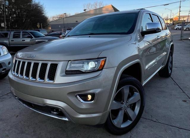 used 2014 Jeep Grand Cherokee car, priced at $14,498