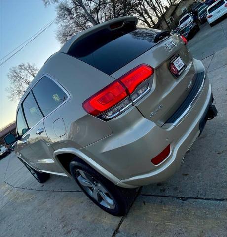 used 2014 Jeep Grand Cherokee car, priced at $14,498