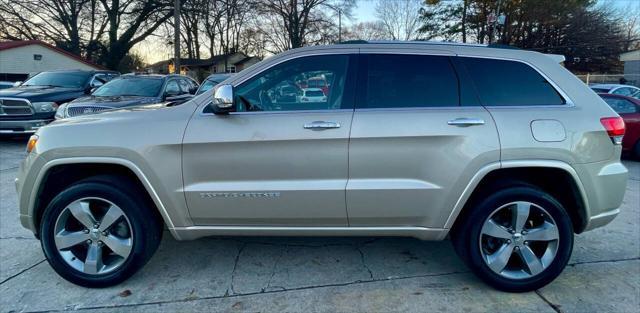 used 2014 Jeep Grand Cherokee car, priced at $14,498