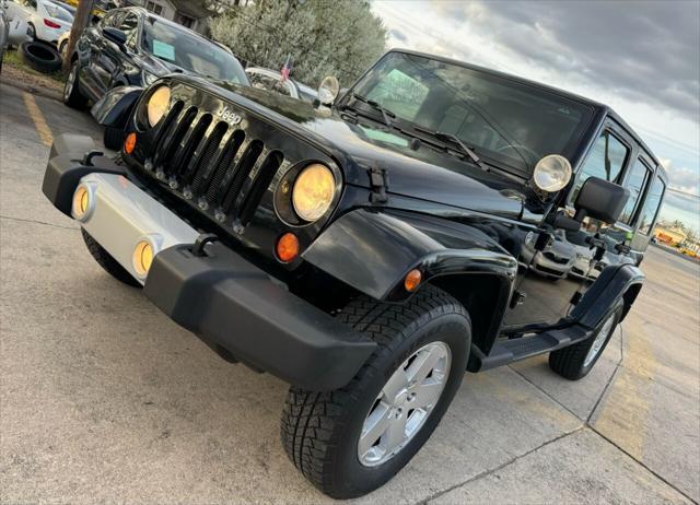 used 2009 Jeep Wrangler Unlimited car, priced at $12,998