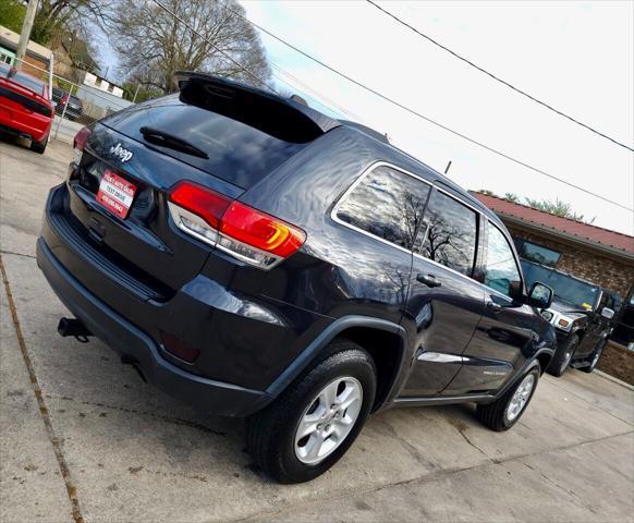 used 2014 Jeep Grand Cherokee car, priced at $10,998