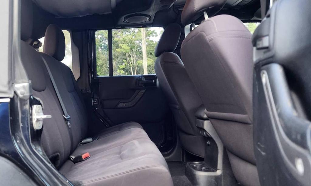 used 2013 Jeep Wrangler Unlimited car, priced at $14,798