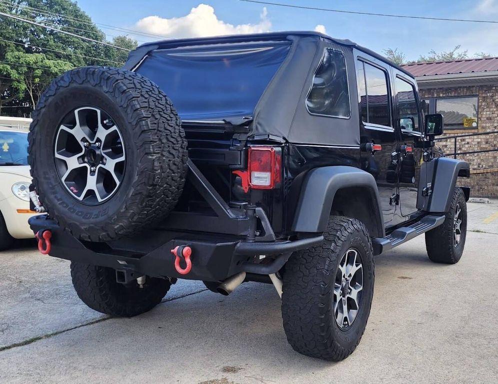 used 2013 Jeep Wrangler Unlimited car, priced at $14,798