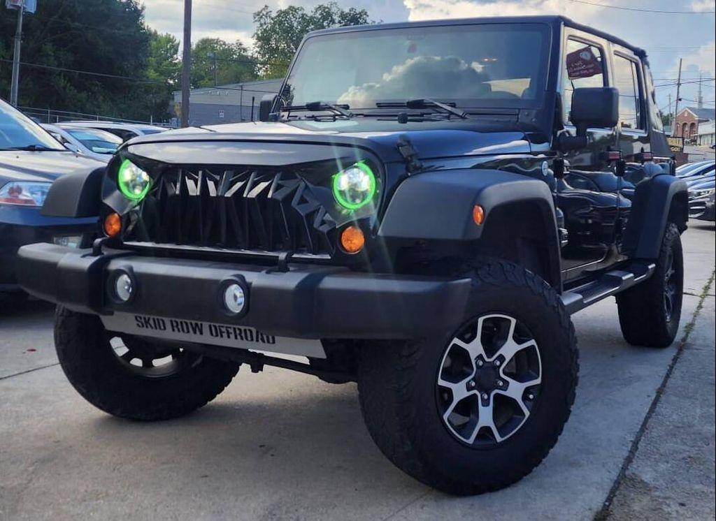 used 2013 Jeep Wrangler Unlimited car, priced at $14,798