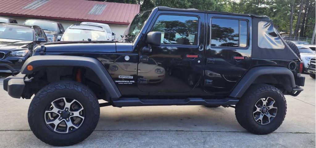 used 2013 Jeep Wrangler Unlimited car, priced at $14,798