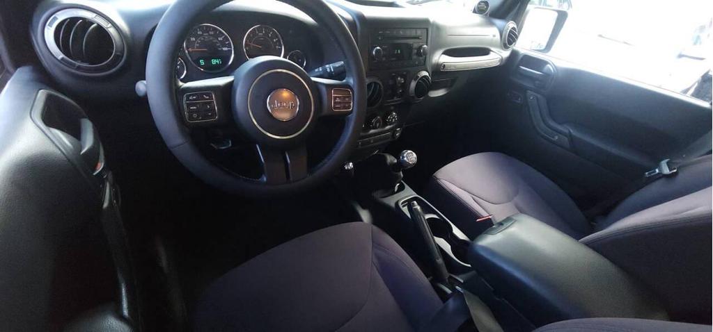 used 2013 Jeep Wrangler Unlimited car, priced at $14,798