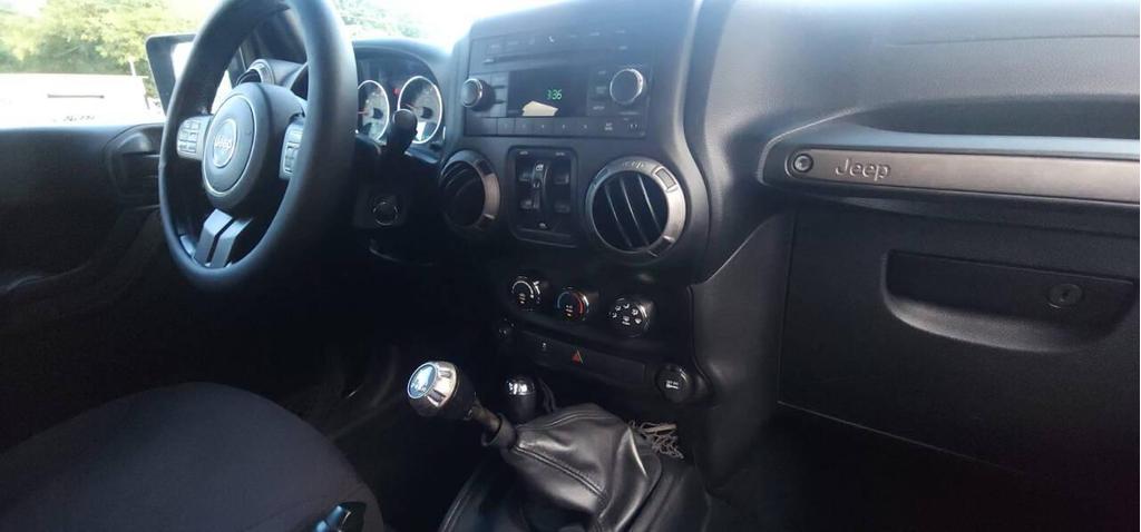 used 2013 Jeep Wrangler Unlimited car, priced at $14,798